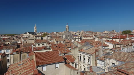 Close-aerial-drone-flight-over-roofs-in-Montpellier-city-center.-Mediterranean